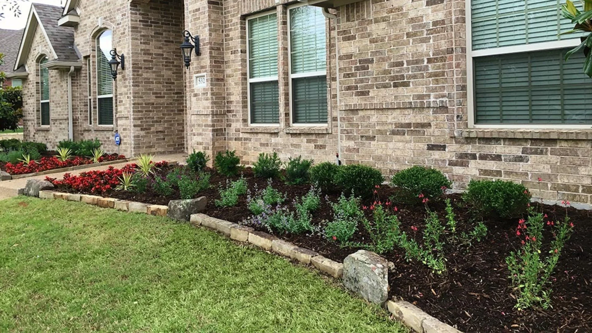 Home with a beautiful landcape bed in Plano, TX.